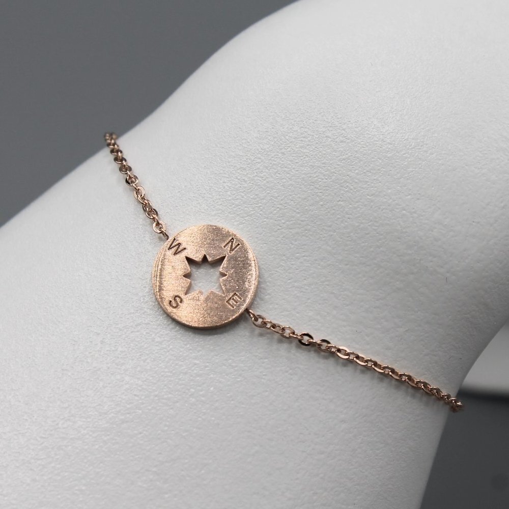 Jewelry bracelet North South East West compass travel adventure rose gold tone